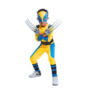 May include: A yellow and blue superhero costume featuring a matching mask with pointed ears, a long-sleeved top, trousers with blue accents, and two grey hand-held claw accessories. The outfit includes a black belt with a red circular emblem.