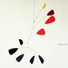 see more listings in the  Kinetic mobiles - paper section