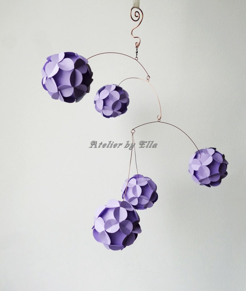 hanging mobile in lavender colors, five paper balls each made of 12 flower shape paper pieces, size of a mobile is as a basket ball size