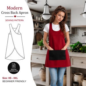 Può includere: Un cartamodello per un grembiule con schiena incrociata con il testo Modern Cross Back Apron, Sewing Pattern, Digital Download e Size: XS - XXL, Beginner Friendly. Il grembiule è rosso scuro con una grande tasca frontale rettangolare nera.