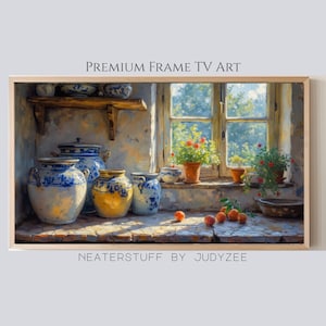 Pode incluir: Impressão emoldurada de uma cena de cozinha com potes de cerâmica azuis e brancos, um pote amarelo e plantas em vasos em uma janela. A impressão tem uma estética rústica e vintage, com o texto "PREMIUM FRAME TV ART" no topo.