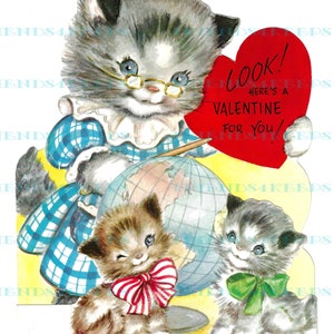 May include: A vintage Valentine's Day card featuring a gray and white cat teacher holding a globe and a red heart that says "Look! Here's a Valentine for you!" Two kittens, one with a red and white bow and the other with a green bow, are standing next to the teacher.