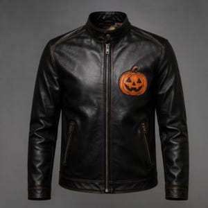May include: A black leather jacket featuring a stand-up collar, a full-length front zip, and two zipped side pockets. An orange pumpkin jack-o'-lantern patch is stitched onto the upper left chest area of the garment.