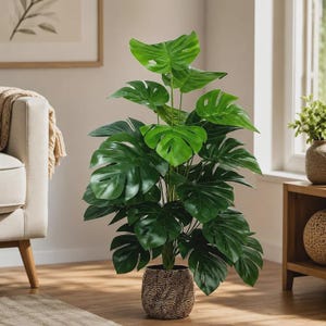 May include: A tall artificial monstera plant with large, vibrant green, split-leaf foliage. The plant is housed in a cylindrical, textured brown pot with a repeating geometric pattern. The leaves are arranged in a dense, upright, and layered structure.