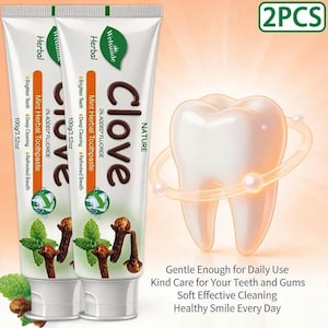 May include: Two white tubes of Welsunde Herbal Clove Nature mint herbal toothpaste, each 100g. The packaging features clove and mint leaf graphics, text stating 0% added fluoride, and a large white tooth icon with the text 2PCS.