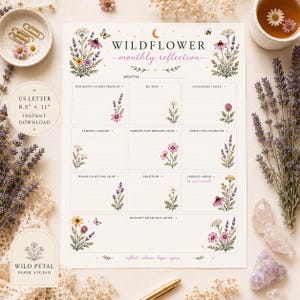 May include: A white paper monthly reflection planner sheet measuring 8.5 inches by 11 inches, featuring wildflower illustrations, a moon icon, and text including Wildflower Monthly Reflection, This Month I'm Most Proud Of, Big Wins, and Challenges I Faced.