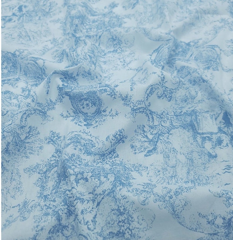 May include: A light blue fabric with a white toile pattern featuring a repeating design of trees and flowers.