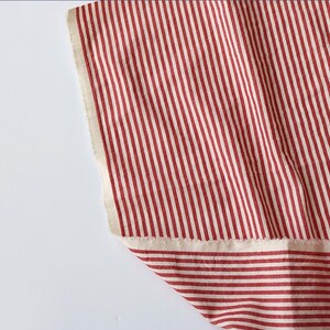 May include: A rustic wooden sign with the word "Welcome" in white lettering. The sign has a distressed finish and a simple design, ideal for a front porch or entrance.