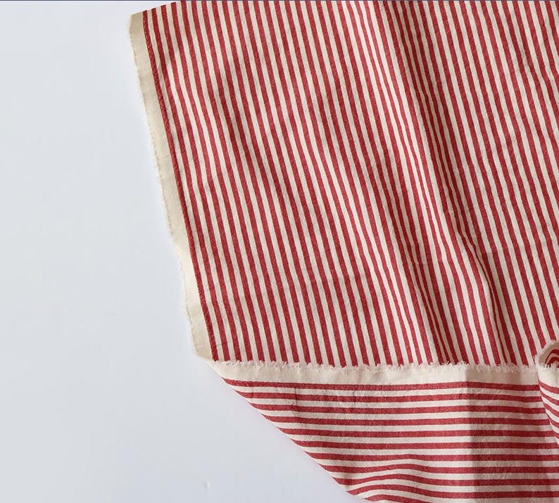 May include: A rustic wooden sign with the word "Welcome" in white lettering. The sign has a distressed finish and a simple design, ideal for a front porch or entrance.