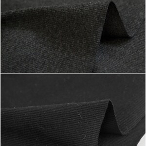 May include: Two close-up images of black fabric. The top image shows a textured fabric with a subtle sheen. The bottom image shows a ribbed fabric.