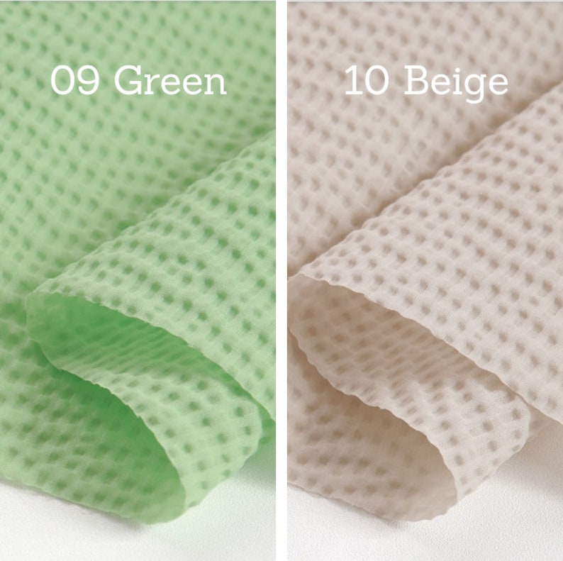 May include: Two pieces of textured fabric, one light green and one beige. The light green fabric is labeled "09 Green" and the beige fabric is labeled "10 Beige". The fabric has a dotted pattern.