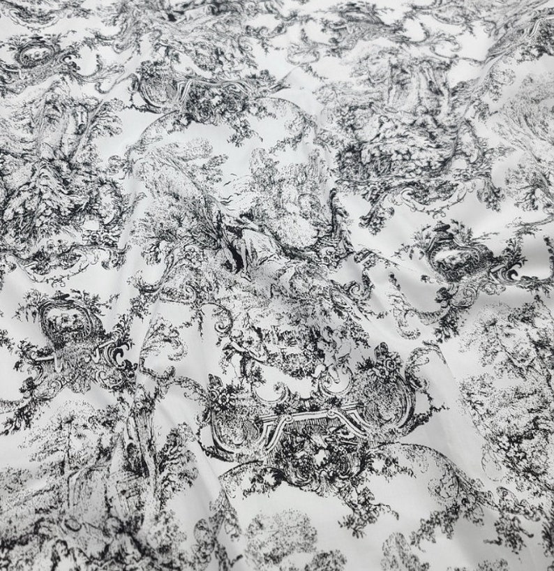 May include: Black and white toile fabric featuring a repeating pattern of trees, flowers, and ornate designs.