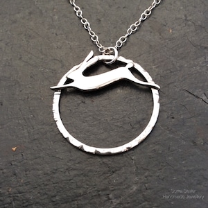 Silver Running hare on a circle