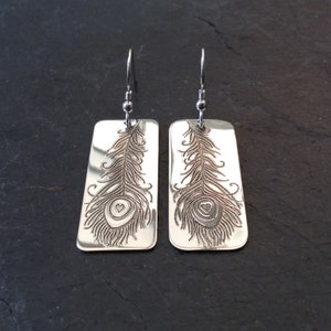 Peacock feather dangle earrings
