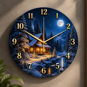 May include: A round wall clock featuring a winter night scene with a snow-covered cabin, pine trees, a full moon, and a small stream. The clock face has gold-colored numbers from 1 to 12 and matching gold-colored hour, minute, and second hands.