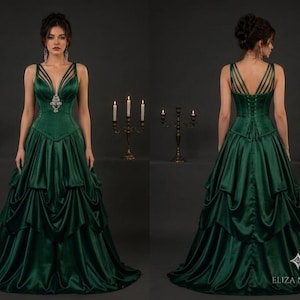 Front and back views of a model wearing a deep green satin gown with a structured bodice, strappy neckline, and tiered skirt.