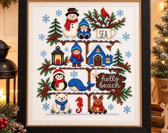 May include: A framed cross-stitch artwork featuring a multi-tiered shelf design with a snowman, penguin, polar bear, reindeer, whale, and small figures. It includes a mug labelled SEA, a blue house, and a sign that reads hello beach.