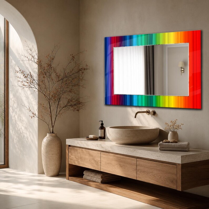 May include: A rectangular wall mirror featuring a vibrant, multi-colored rainbow border with vertical stripes in shades of red, orange, yellow, green, blue, and violet. The mirror has a smooth, reflective center surface and a glossy finish.
