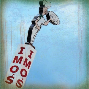 May include: A vintage neon sign featuring a chef holding a pizza. The sign is black and white with red lettering that reads "IMMO'S". The background is a textured blue and green.