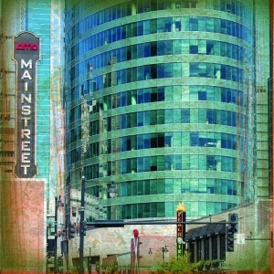 May include: An urban landscape featuring a tall, curved glass building with teal-colored windows. A vintage sign reading "AMC Mainstreet" is visible on the left. The image has a textured, artistic overlay, suggesting a retro or vintage aesthetic.