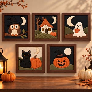 May include: A set of five square wall art pieces in dark wood frames, featuring fabric applique designs of a witch-hatted owl, a house, a ghost with a pumpkin, a black cat with a pumpkin, and a jack-o'-lantern, all set against night scenes.
