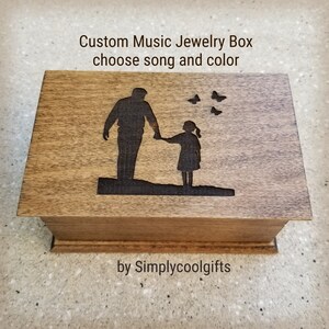 music box with dad and daughter engraved on the top, choose color and song, add personalized message on the bottom side of the box, music box by Simplycoolgifts