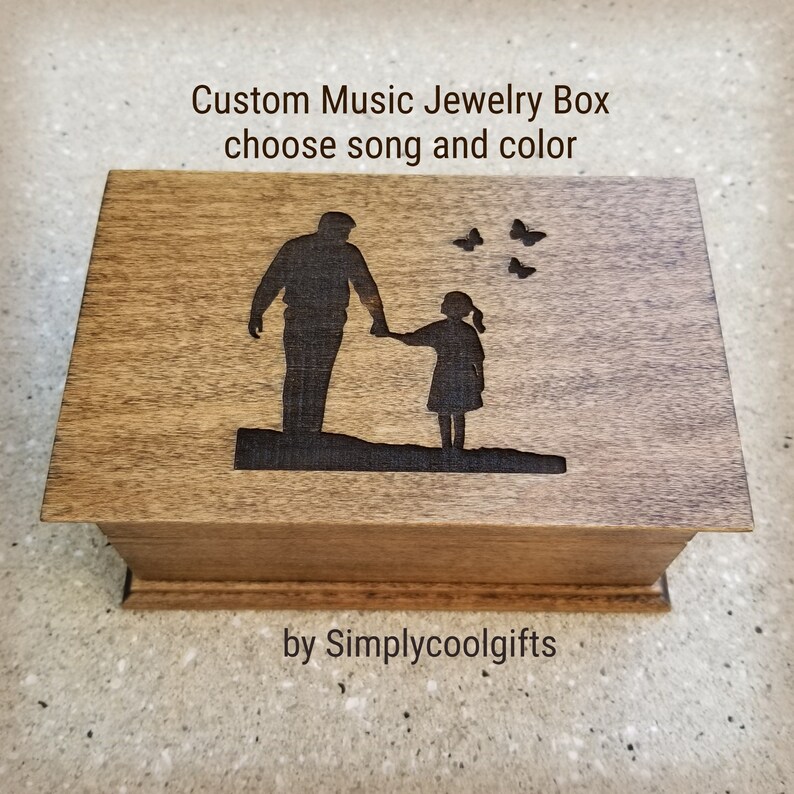 music box with dad and daughter engraved on the top, choose color and song, add personalized message on the bottom side of the box, music box by Simplycoolgifts