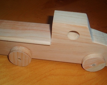Houten stuk speelgoed pick-up truck
