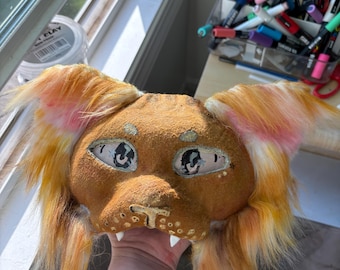 A apple juice inspired cat mask!