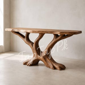 May include: A console table crafted from natural brown wood, featuring a smooth, elongated rectangular top supported by a base designed to resemble the trunk and spreading roots of a tree, with a light brown finish and visible wood grain.