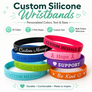 May include: A collection of silicone wristbands in various colors including black, blue, green, pink, purple, and orange. The bands feature embossed or printed text and symbols such as "Custom Message," "Team Pride," "Hope," "Support," and "Be Kind."