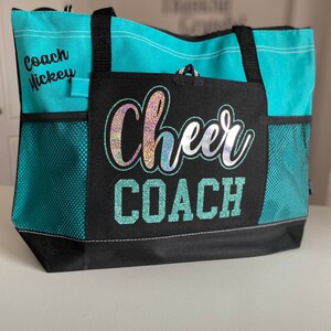 Teal bag with hologram Cheer and teal writing