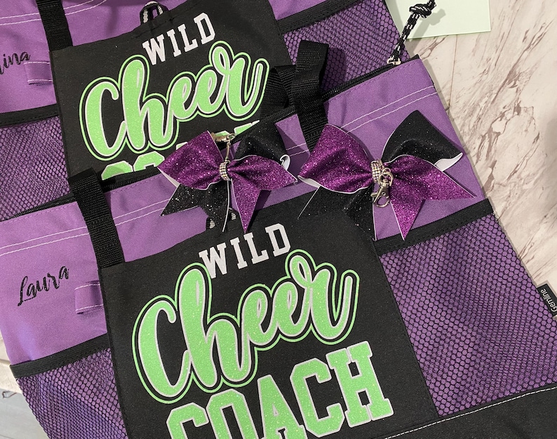 Beautiful purple bag with lime green and white writing. very functional yet blingy.