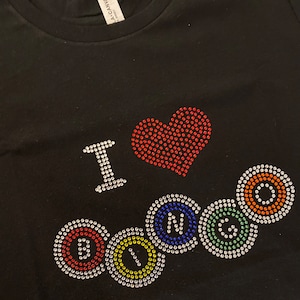 J'adore le t-shirt Bingo avec strass.