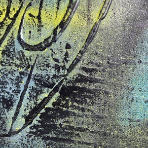 May include: A textured canvas painting featuring a blend of black, teal, and bright yellow spray paint. The surface displays raised, dark, linear ridges and splattered paint droplets, creating a layered, abstract composition with a rough finish.