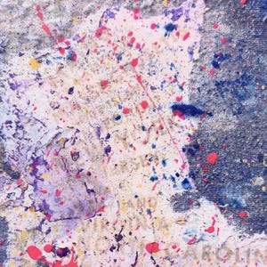 May include: An abstract painting featuring a textured surface with layers of blue, white, and purple paint. Splatters of bright pink, yellow, and dark blue cover the canvas. Faint text is visible, including the words New York, New Jersey, and North Carolina.