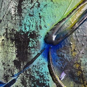 May include: An abstract painting on canvas featuring a textured surface with layers of black, teal, and lime green paint. Thick, raised black lines create a focal point, with splatters of blue and yellow accents across the coarse, woven fabric.