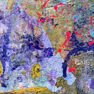 May include: An abstract painting on canvas featuring a textured surface with layers of paint in shades of purple, blue, yellow, and gold. The composition includes vibrant neon pink paint splatters and drips scattered across the textured background.