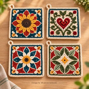 May include: Four square crochet potholders with hanging loops. The top left features a yellow sunflower on a dark blue background. The top right shows a red heart with green vines. The bottom left has a white and blue floral motif. The bottom right displays a green leaf pattern on a red background. Text reads: Design by Moderncrochet4U.
