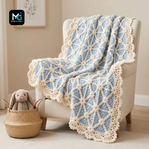 May include: A light blue and cream crochet blanket featuring a geometric star pattern and a scalloped border. The blanket is draped over a chair next to a woven basket containing a plush rabbit toy. The logo Moderncrochet4u is visible.