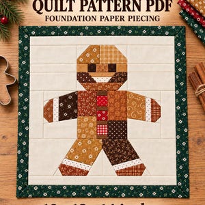 May include: A square quilt block featuring a gingerbread man design made from various brown, red, and white floral and patterned fabrics. The block has a dark green floral border and text reading GINGERBREAD MAN QUILT PATTERN PDF 10 12 14 inches.