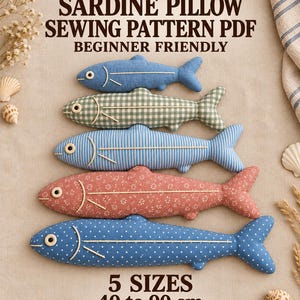 May include: A digital sewing pattern for a sardine pillow, featuring text SARDINE PILLOW SEWING PATTERN PDF BEGINNER FRIENDLY and 5 SIZES 40 to 90 cm. Five stuffed fish pillows in blue, green gingham, striped, floral, and polka dot patterns are shown.