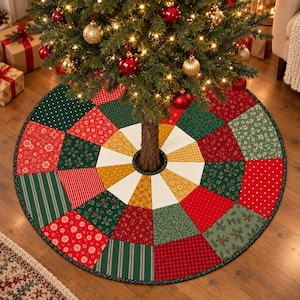 May include: A circular Christmas tree skirt featuring a patchwork design of various fabric patterns in red, green, gold, and white. The quilt-style mat is composed of trapezoidal panels with floral, striped, plaid, and polka dot prints.