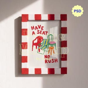 May include: A rectangular picture frame with a red and white striped pattern. Inside the frame is a white print featuring illustrations of four different chairs in red, blue, yellow, and green, with the red text "HAVE A SEAT NO RUSH" printed.