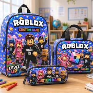 May include: A blue backpack, lunch bag, and pencil case set featuring Roblox characters, colorful stars, and pixelated patterns. The backpack displays the text Roblox, Custom Name, and Level Up. The lunch bag says Roblox, Play, Build, Explore, and the pencil case says Custom Name.