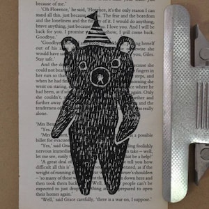 Original hand cut lino print on a vintage book page / wall art