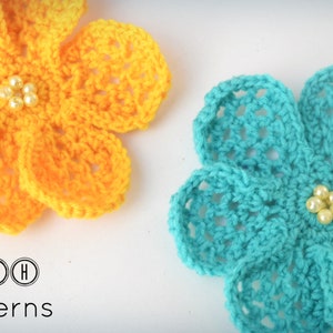 May include: Two crocheted flowers, one yellow and one turquoise, with pearl beads in the center. TLH Patterns.