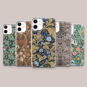 May include: Five smartphone cases arranged in a row, each featuring a distinct intricate botanical pattern. The designs include swirling acanthus leaves, floral motifs, and vines in various colour palettes of deep blue, brown, grey, and green.