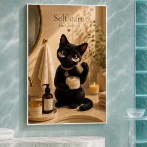 May include: A framed wall art print featuring a black cat with gold collar and eye patches holding a jar labeled Revive. The text reads Self care isn't selfish with a heart icon. The scene includes a towel, soap dispenser, and candle.