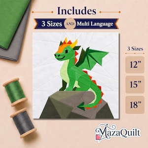 May include: A quilt pattern featuring a green dragon on a rock against a white background. Text includes Includes 3 Sizes AND Multi Language and 12, 15, 18 inches. Two spools of thread in green and grey are visible alongside the MazaQuilt logo.
